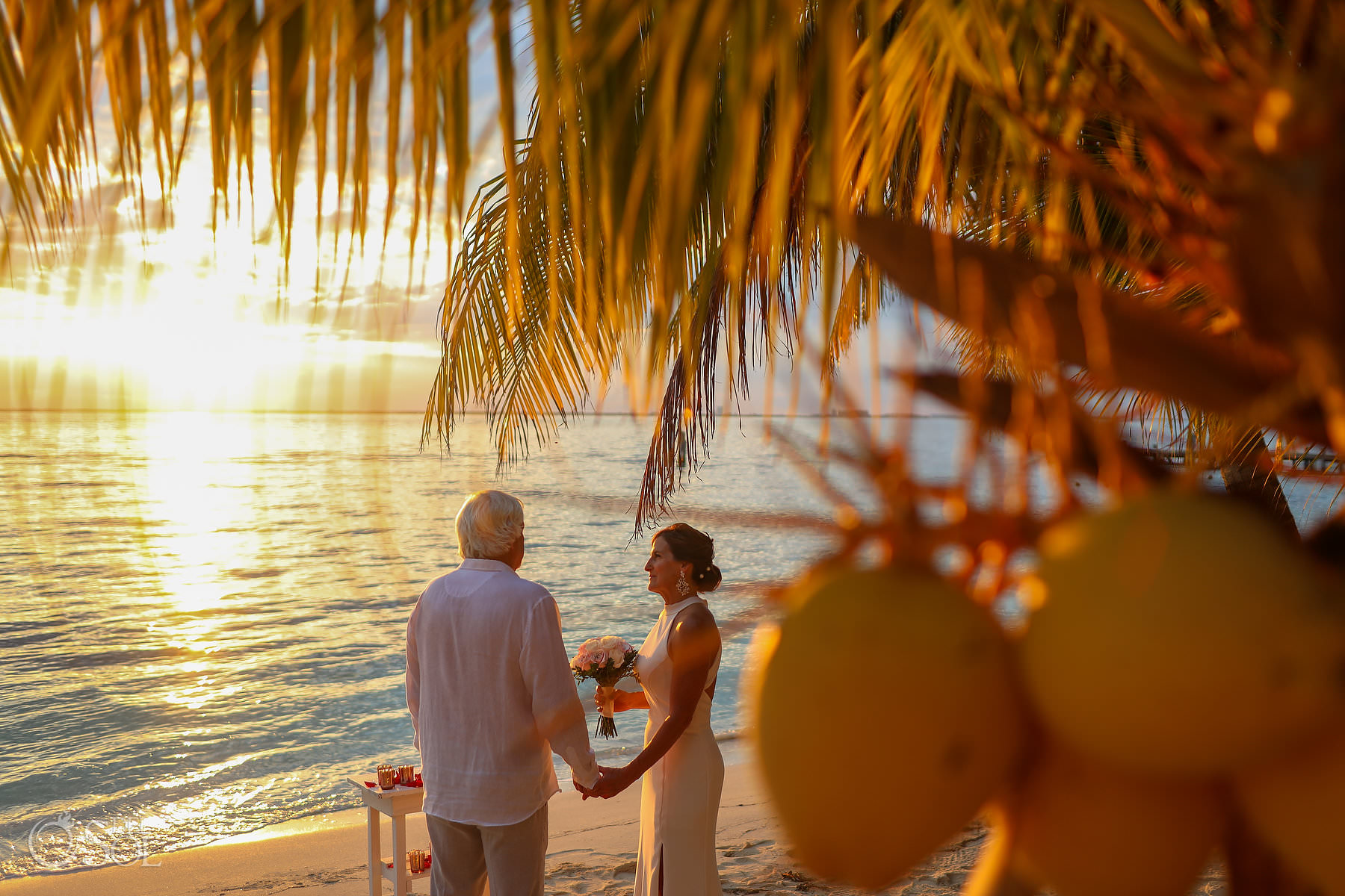 elope in Mexico private villa Isla Mujeres sunset ceremony on the beach